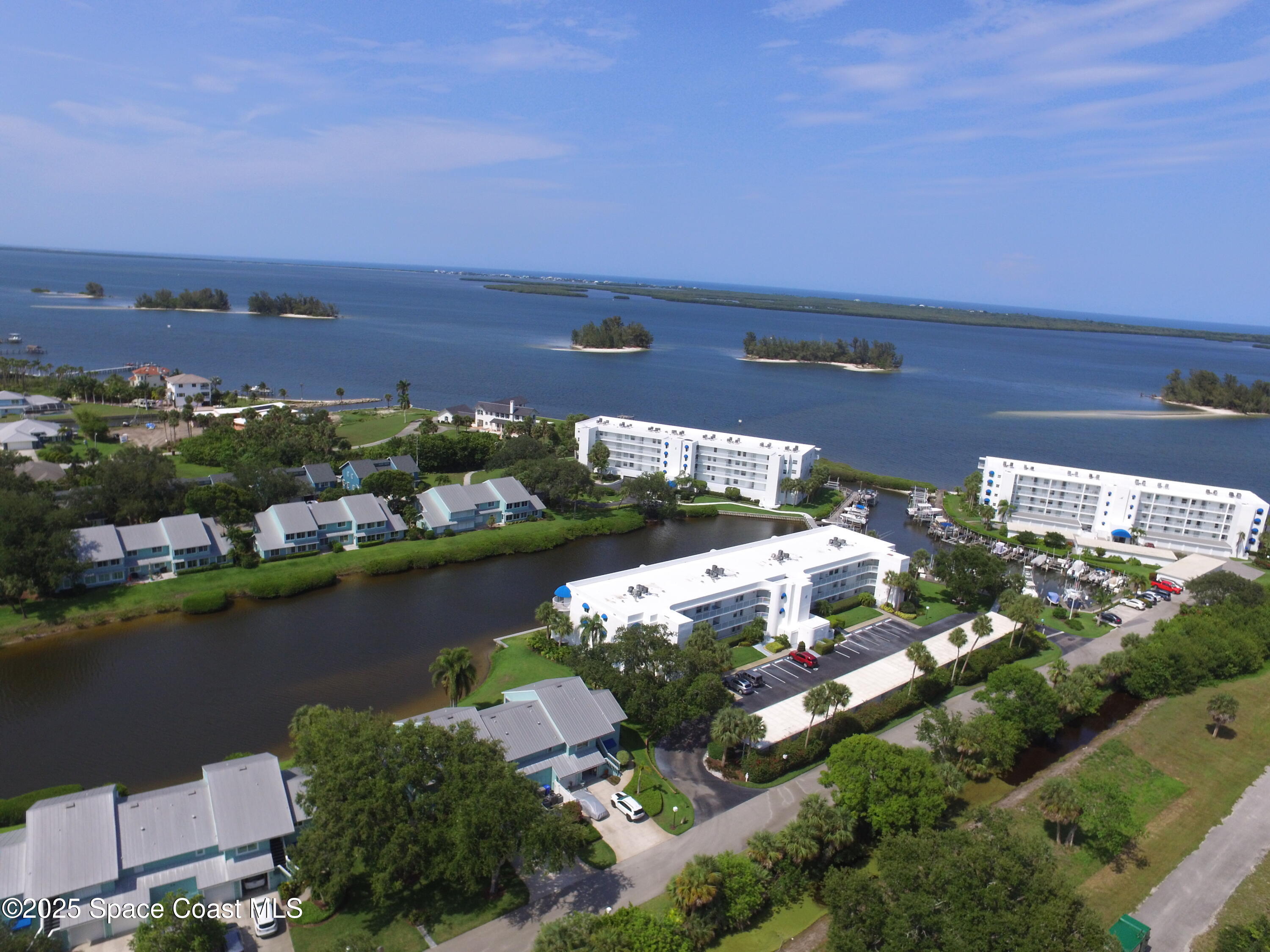 6124 River Run Drive Sebastian, FL 32958 - Photo 42 of 42 an aerial view of a city with lots of residential buildings lake and ocean view