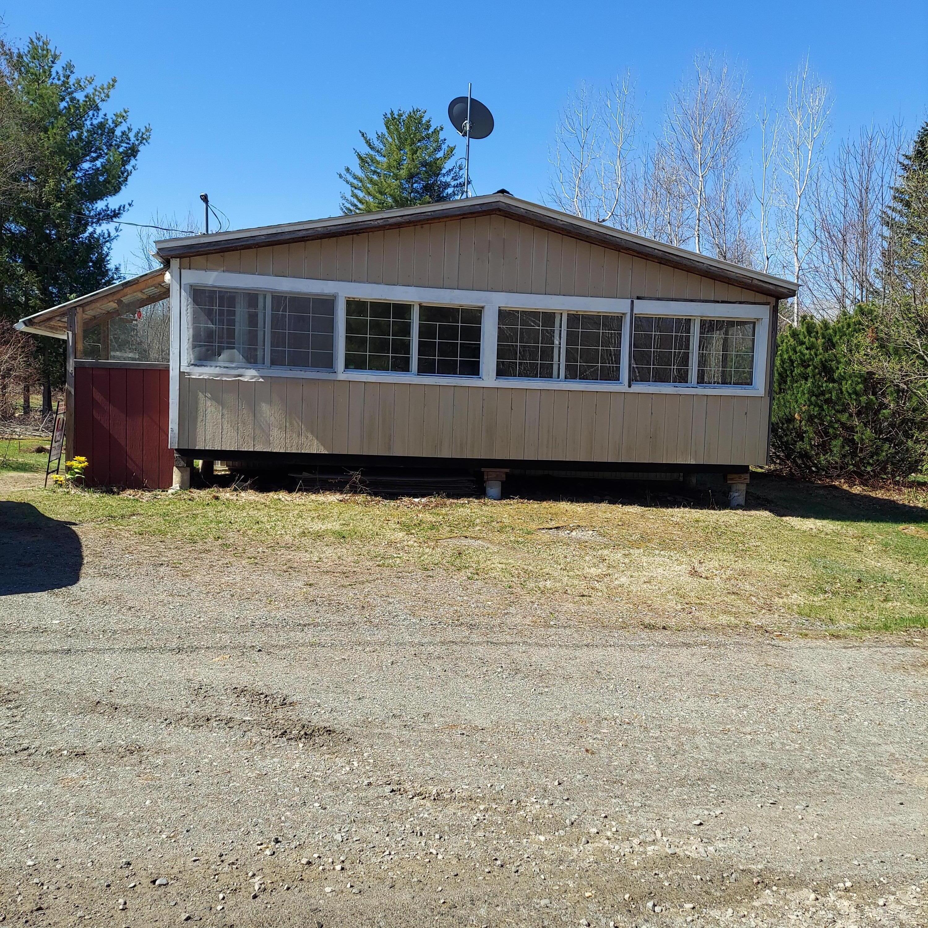 335 Swan Road New Sharon, ME 04955 - Photo 2 of 31 Front of Mobile