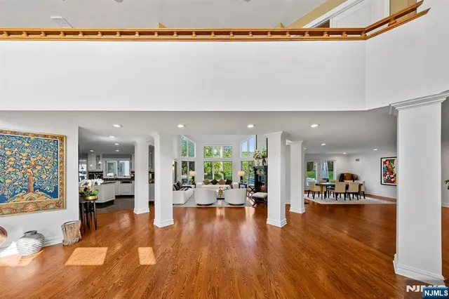 a view of a living room and kitchen