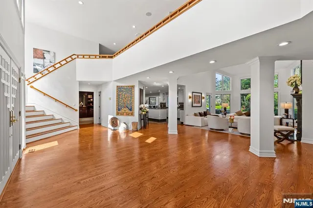 a view of dining room with furniture and wooden floor
