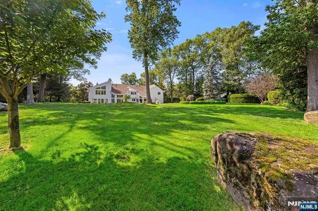 a view of a golf course with a trees