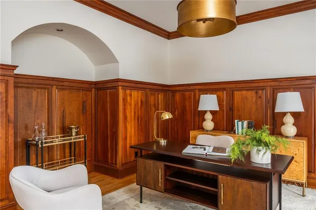 a bathroom with a toilet sink and vanity