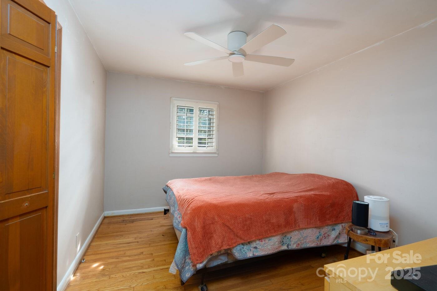 702 Rhodes Avenue Kings Mountain, NC 28086 - Photo 14 of 17 a bedroom with a bed and window