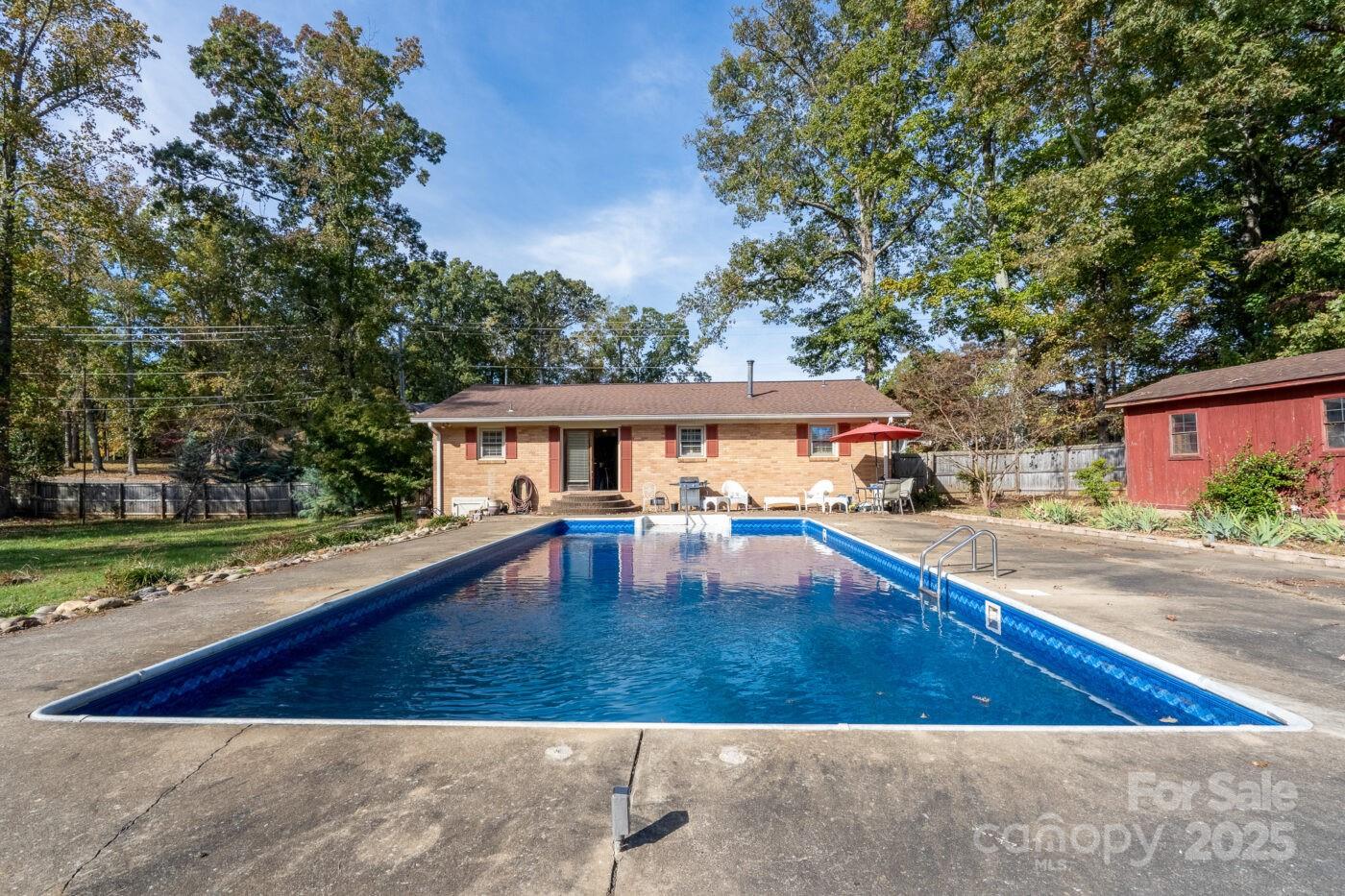 702 Rhodes Avenue Kings Mountain, NC 28086 - Photo 17 of 17 a view of a swimming pool with an outdoor space