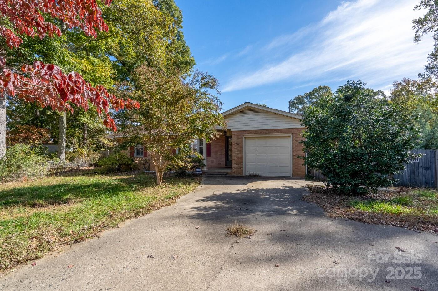 702 Rhodes Avenue Kings Mountain, NC 28086 - Photo 2 of 17 a view of a house with yard and a tree