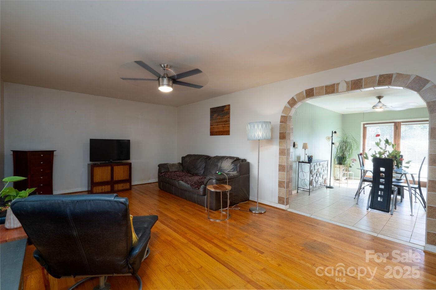 702 Rhodes Avenue Kings Mountain, NC 28086 - Photo 6 of 17 a living room with furniture and wooden floor
