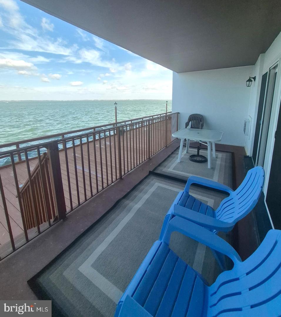 745 Mooring Road, Unit 103 Ocean City, MD 21842 - Photo 1 of 14 a view of balcony with furniture