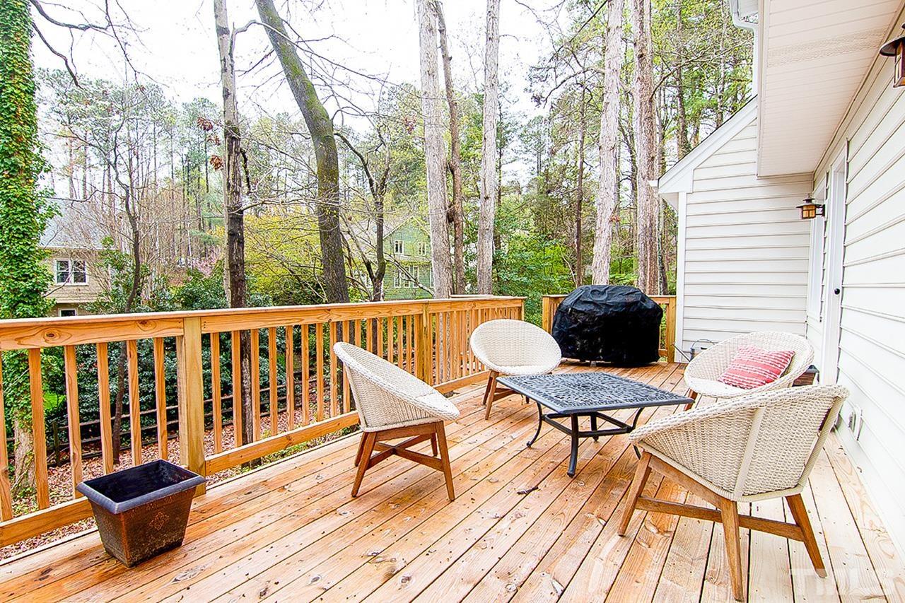 7300 Quinby Court Raleigh, NC 27613 - Photo 5 of 29 a view of a chairs and table on the deck
