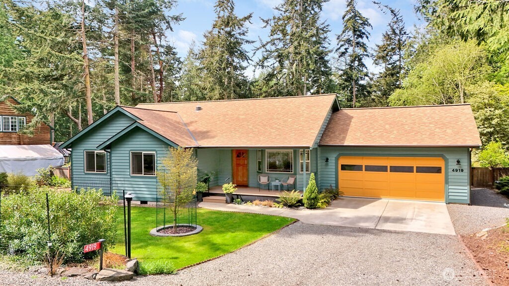 4919 Bell Street Port Townsend, WA 98368 - Photo 1 of 40 a view of a house with garden and plants