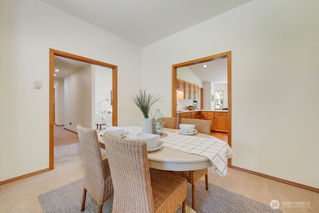 4919 Bell Street Port Townsend, WA 98368 - Photo 13 of 40 a view of a dining room with furniture