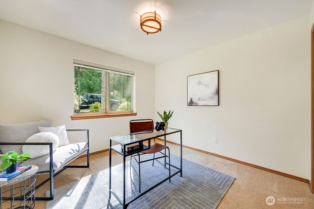 4919 Bell Street Port Townsend, WA 98368 - Photo 27 of 40 a workspace with furniture and a window