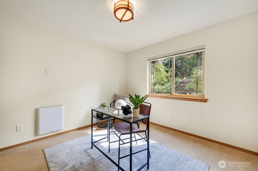 4919 Bell Street Port Townsend, WA 98368 - Photo 28 of 40 a dining room with furniture and window