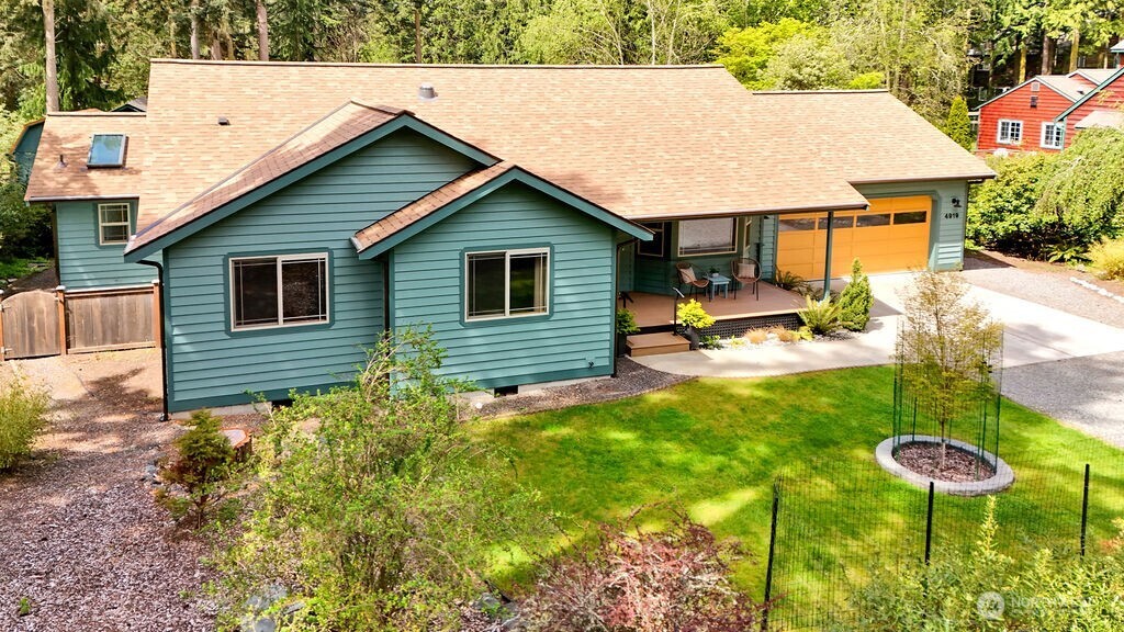 4919 Bell Street Port Townsend, WA 98368 - Photo 3 of 40 a backyard of a house with seating space