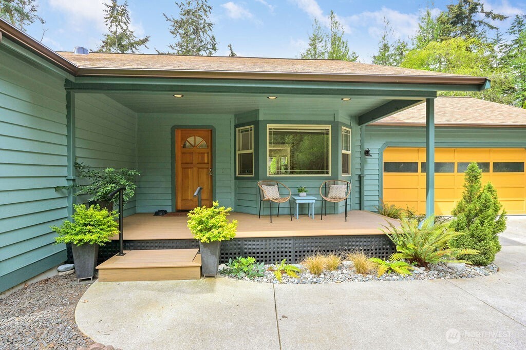 4919 Bell Street Port Townsend, WA 98368 - Photo 4 of 40 a front view of a house with garden