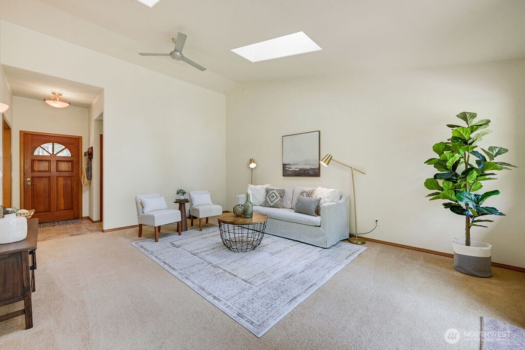 4919 Bell Street Port Townsend, WA 98368 - Photo 7 of 40 a living room with furniture and a potted plant