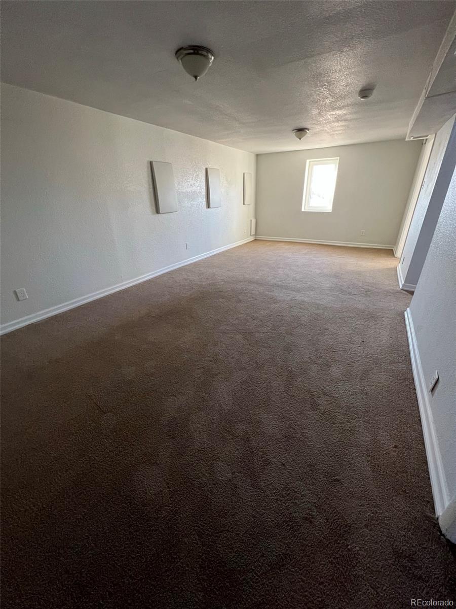 1245 Yates Street Denver, CO 80204 - Photo 20 of 24 a view of room and window