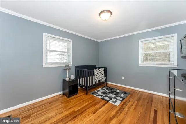 a view of a livingroom with furniture and a flat screen tv