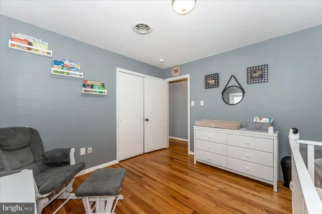 a kitchen with a sink and a refrigerator