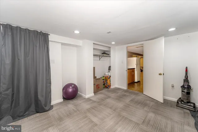 a view of a house with backyard porch and sitting area