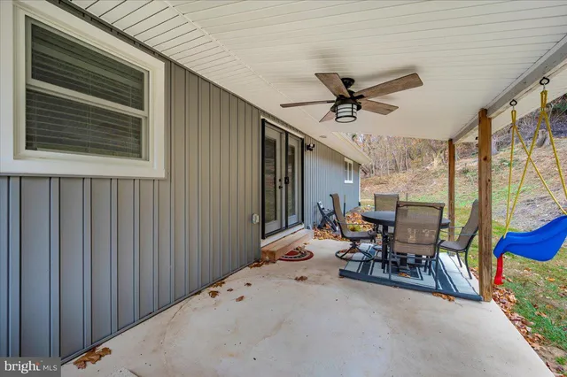 a view of a yard with a tree
