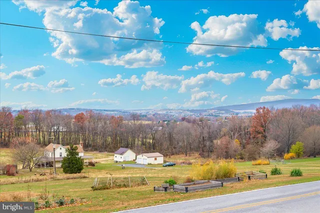 a view of a house with swimming pool