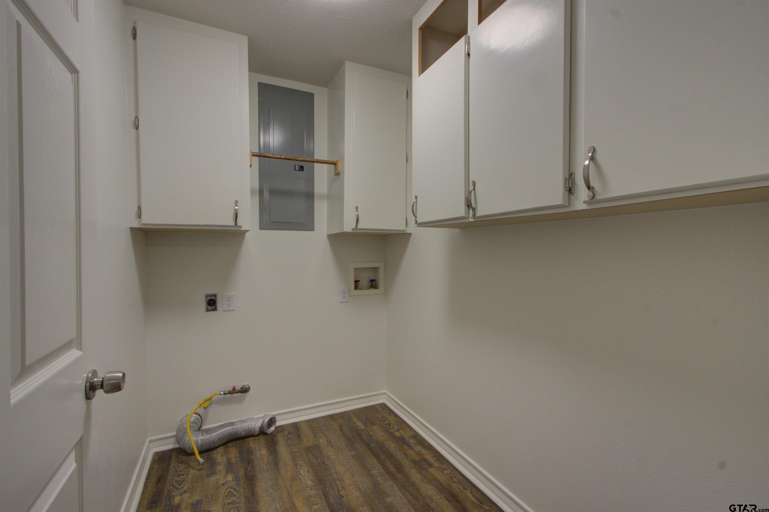 720 Tennessee Acres Drive Texarkana Ar, AR 71854 - Photo 23 of 31 a view of storage and utility room with empty racks