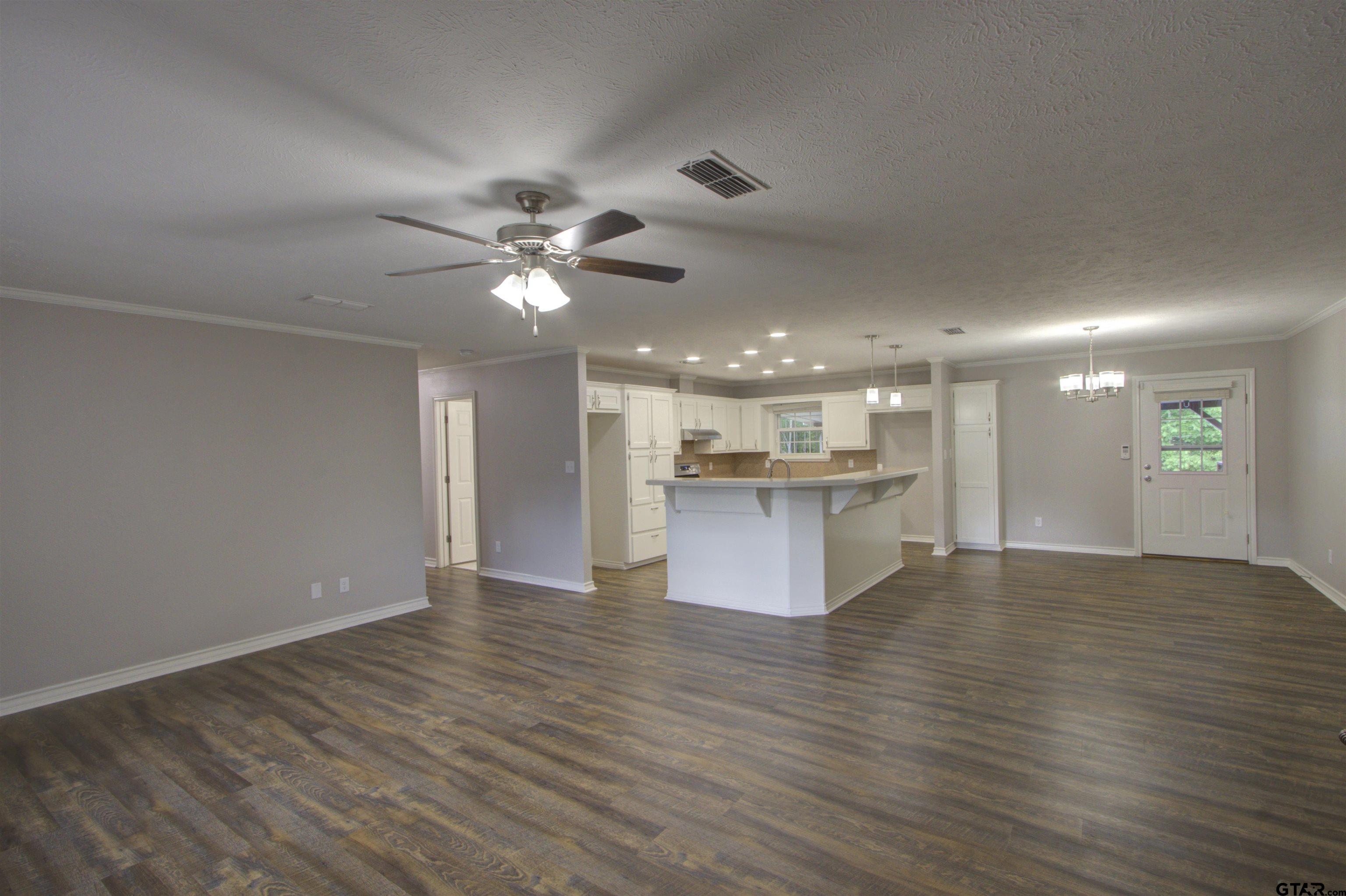 720 Tennessee Acres Drive Texarkana Ar, AR 71854 - Photo 4 of 31 a view of kitchen and hall with wooden floor