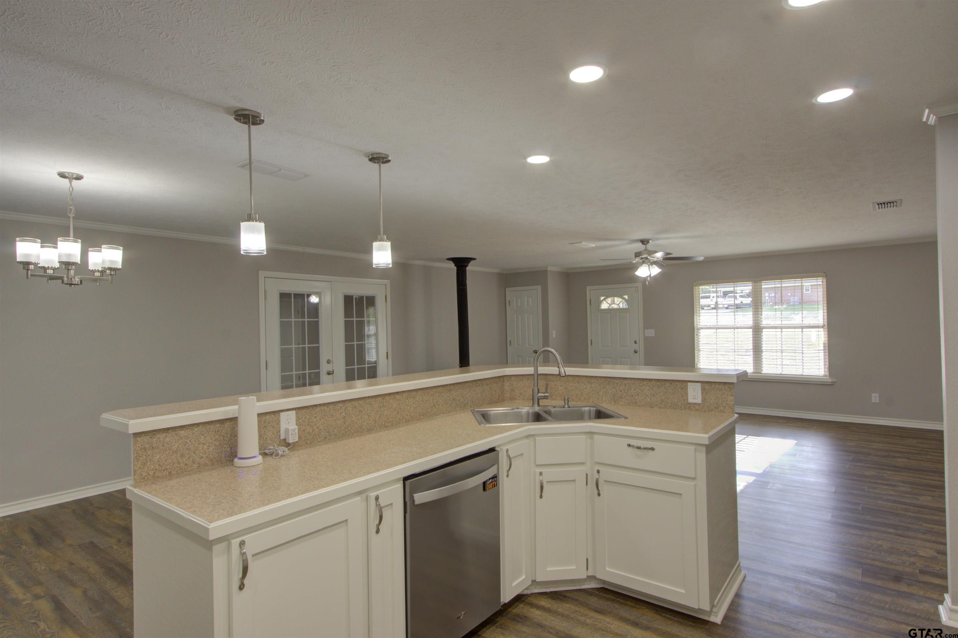 720 Tennessee Acres Drive Texarkana Ar, AR 71854 - Photo 8 of 31 a view of a sink and mirror with wooden floor