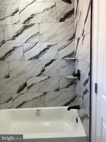 a bathroom with a bathtub