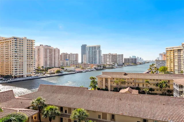 a view of a city with tall buildings