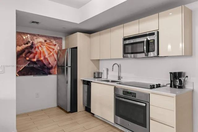 a bedroom with furniture and wooden floor