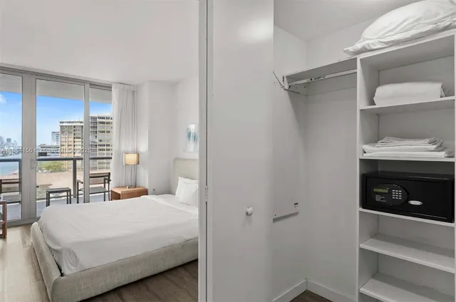 a view of entryway and hall with a cabinet