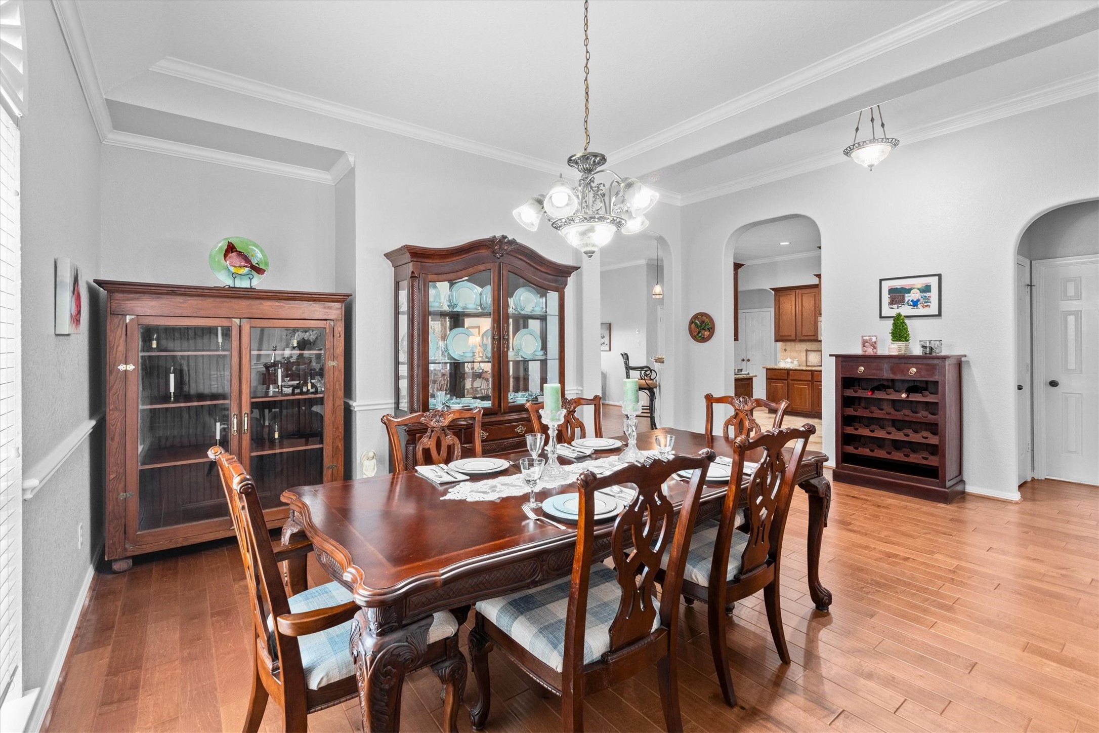 9406 Lochflora Drive Spring, TX 77379 - Photo 10 of 49 a view of a dining room with furniture and chandelier