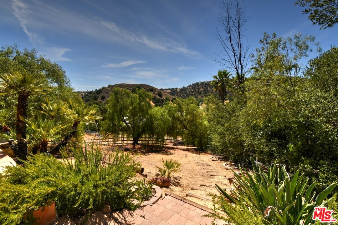 24926 Jim Bridger Road Hidden Hills, CA 91302 - Photo 22 of 28 a view of mountain view with mountains in the background