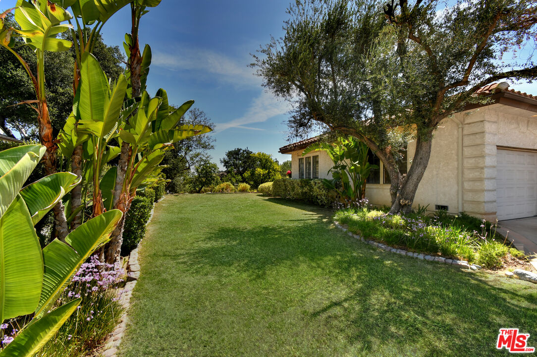 24926 Jim Bridger Road Hidden Hills, CA 91302 - Photo 25 of 28 a view of yard with green space