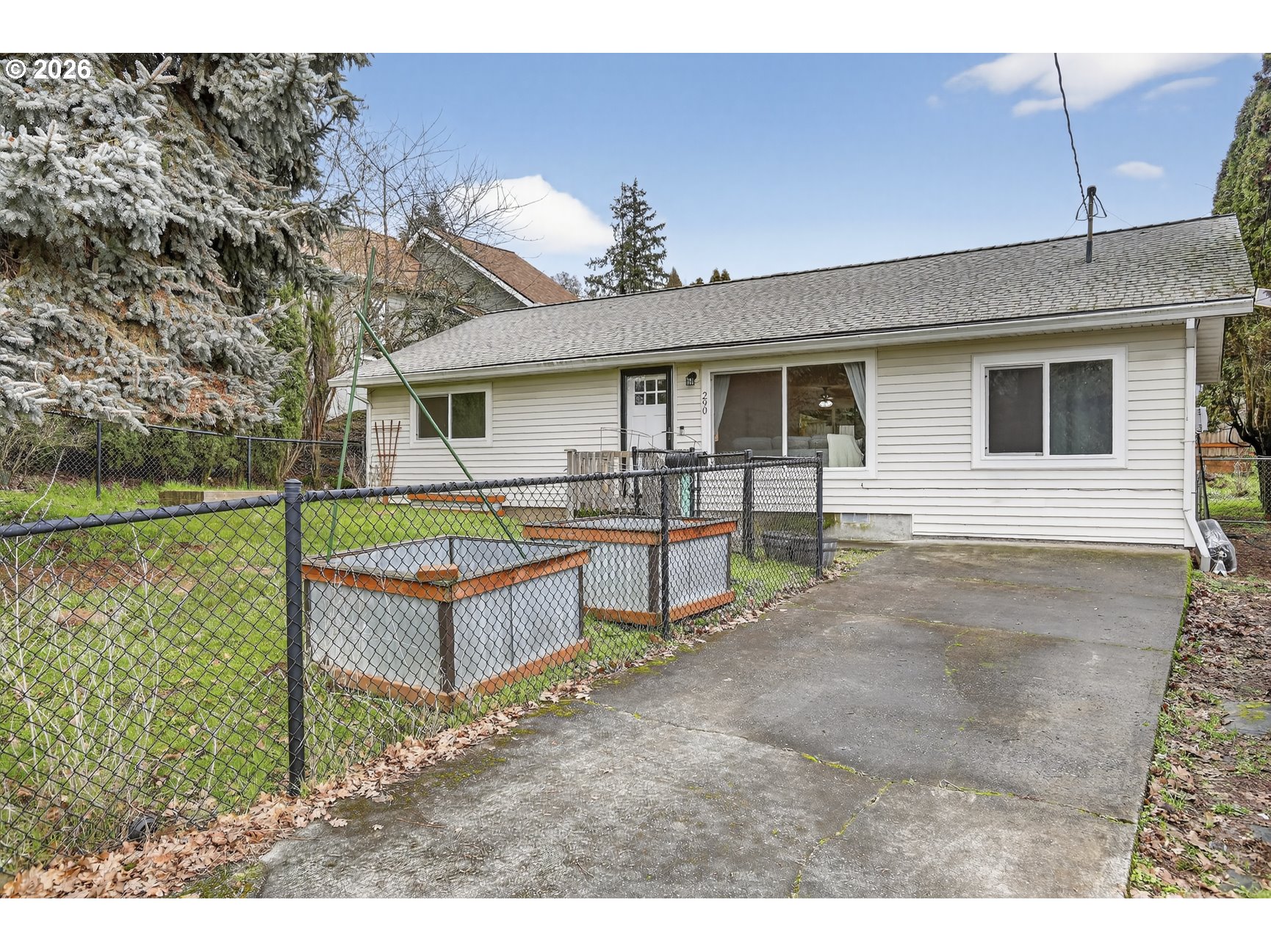290 North 4th Street St. Helens, OR 97051 - Photo 2 of 26 a view of a house with backyard and a tree