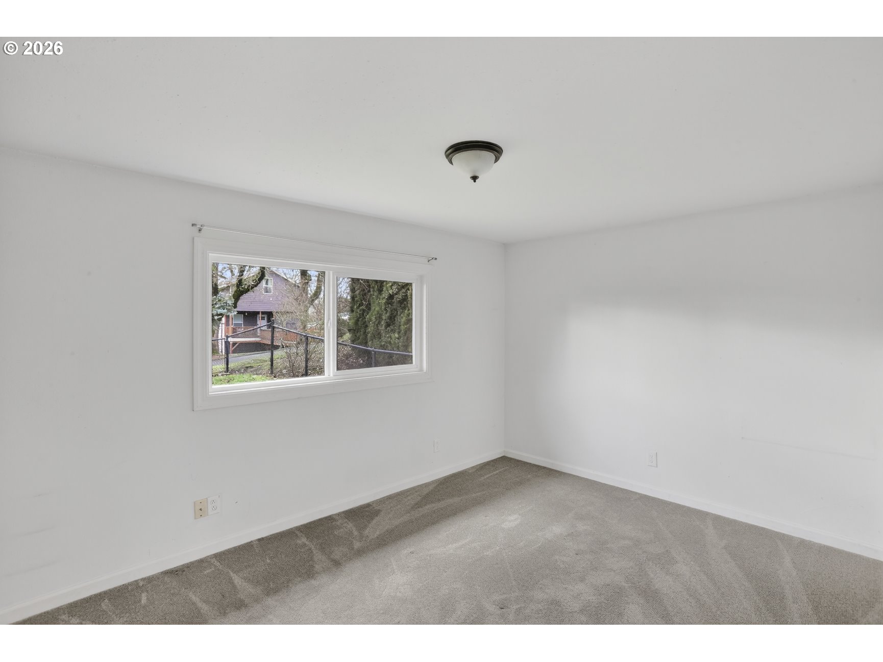 290 North 4th Street St. Helens, OR 97051 - Photo 21 of 26 a view of an empty room with a window