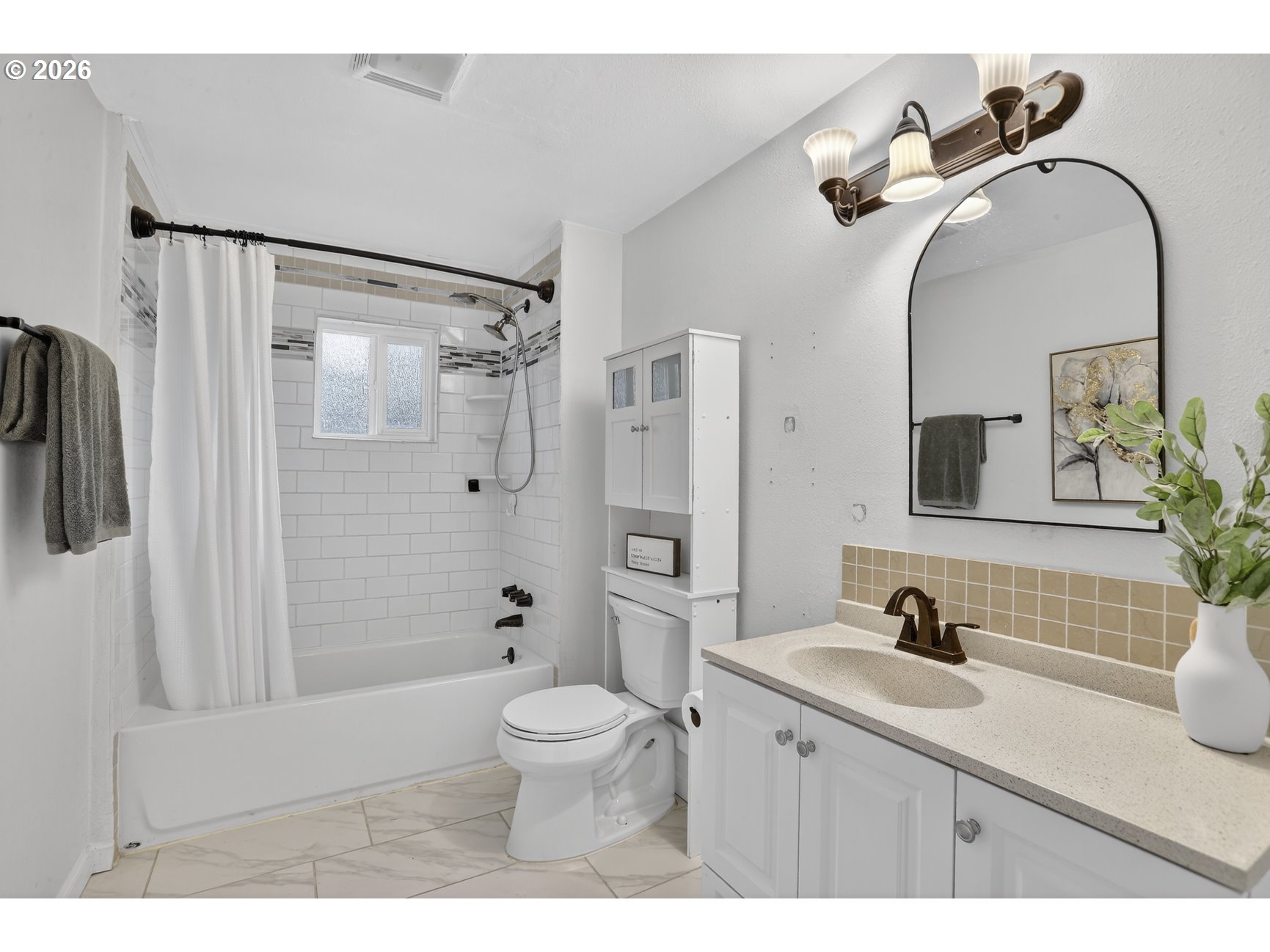 290 North 4th Street St. Helens, OR 97051 - Photo 22 of 26 a bathroom with a sink and a mirror