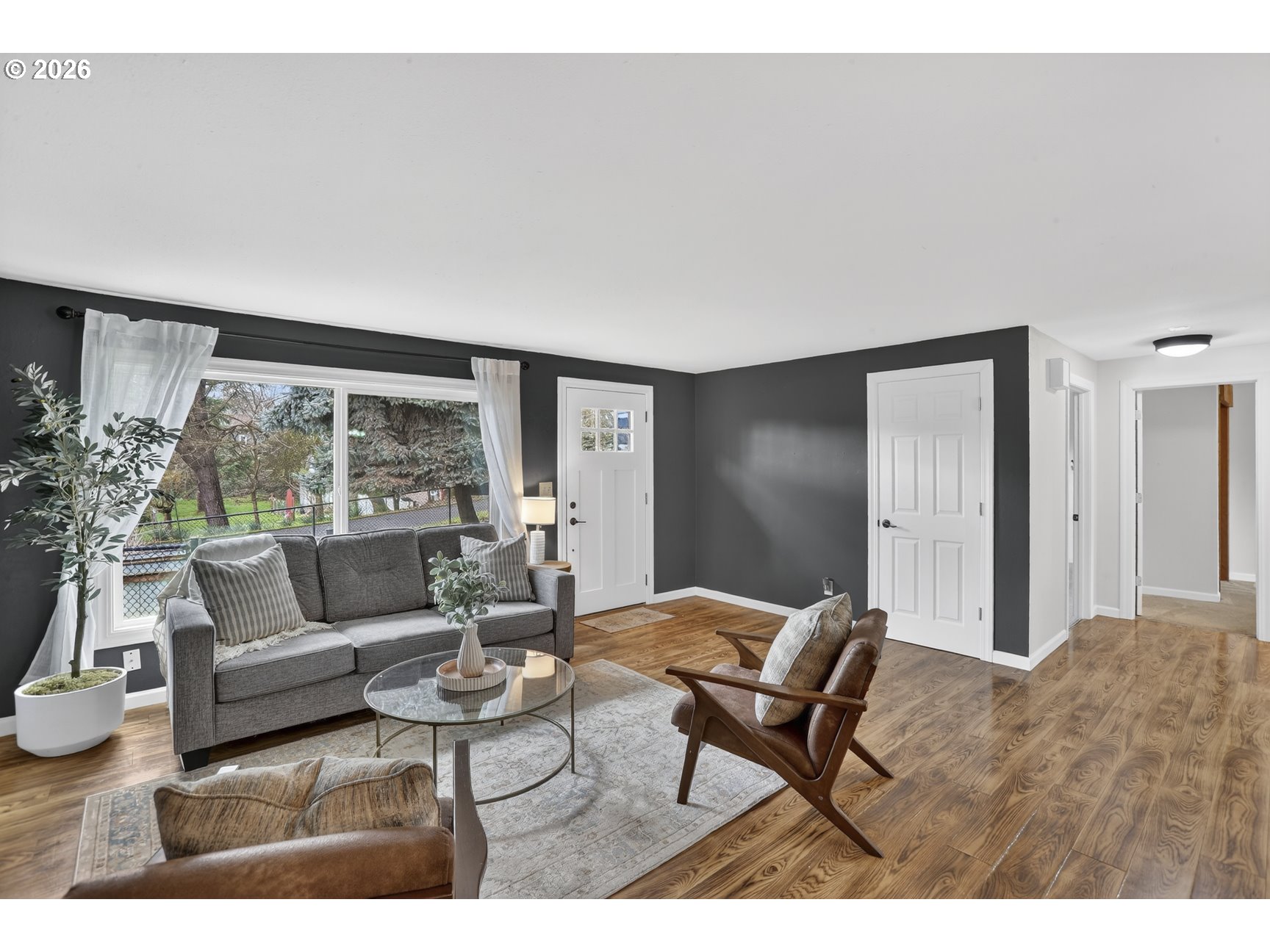 290 North 4th Street St. Helens, OR 97051 - Photo 4 of 26 a living room with furniture and a large window