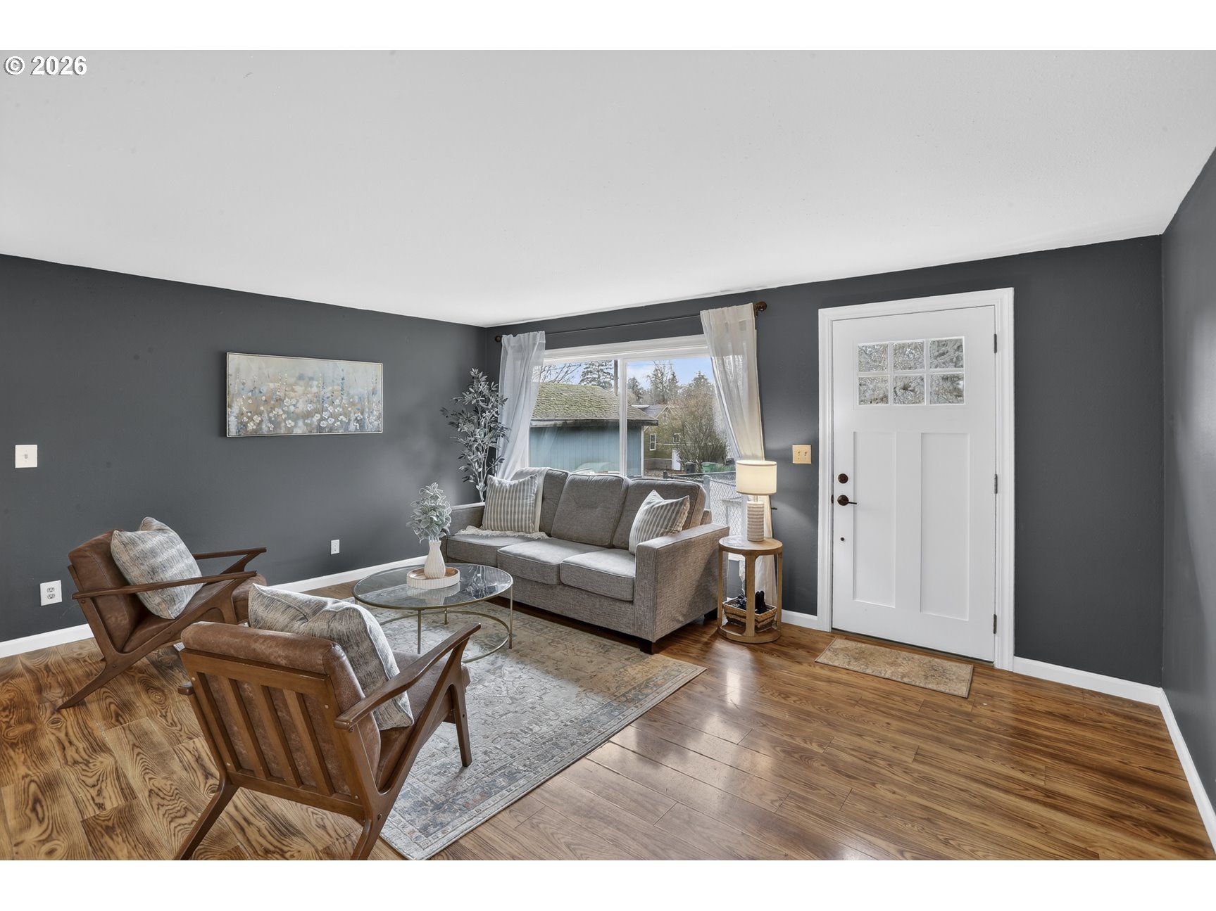 290 North 4th Street St. Helens, OR 97051 - Photo 6 of 26 a living room with furniture window and a wooden floor