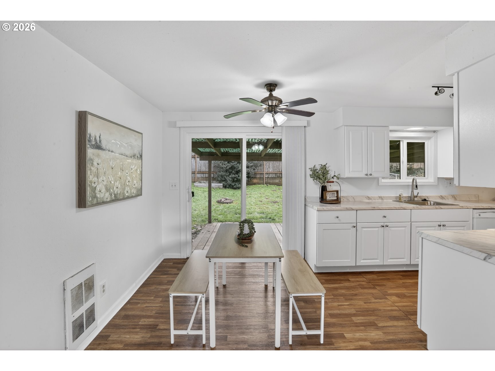 290 North 4th Street St. Helens, OR 97051 - Photo 8 of 26 a living room with furniture a flat screen tv and a window