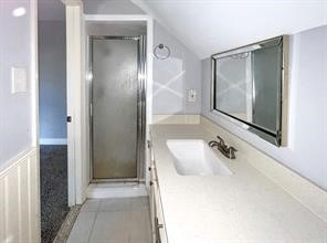 17715 Loring Lane Spring, TX 77388 - Photo 8 of 11 a bathroom with a tub sink and mirror