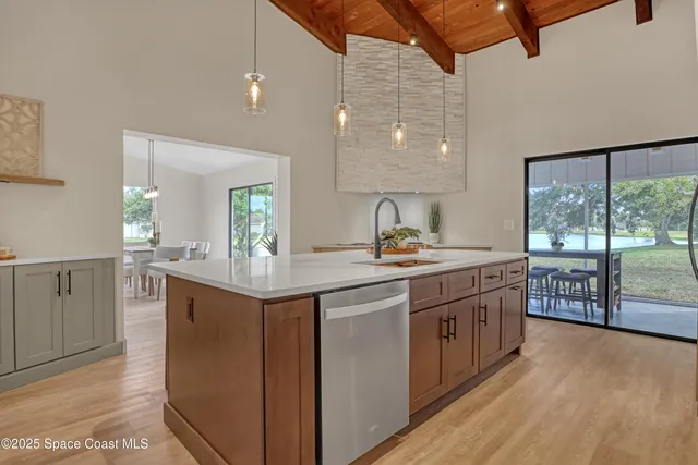a stove top oven sitting inside of a kitchen