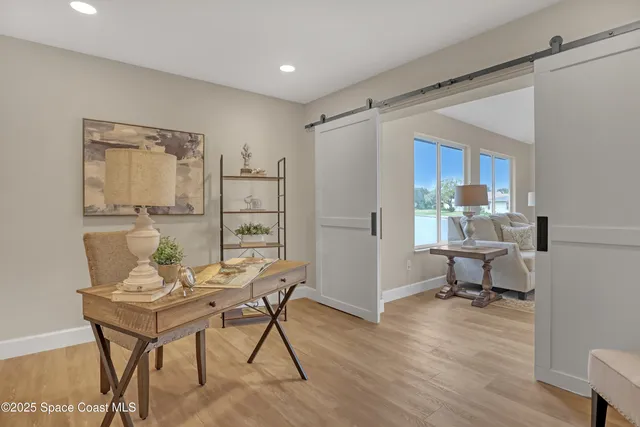 a bathroom with a toilet and a shower curtain