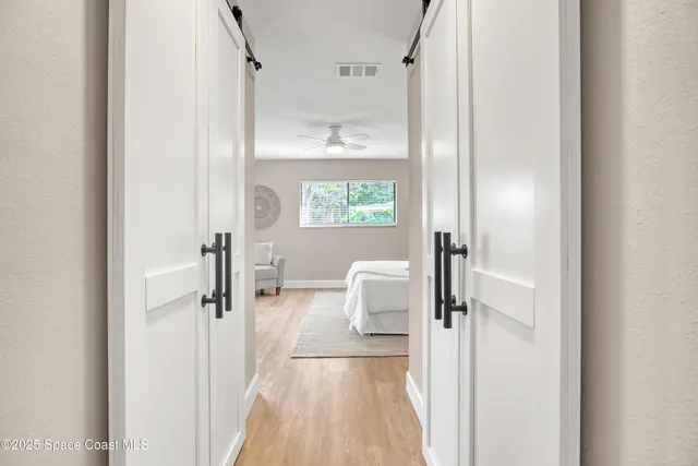 a view of livingroom with furniture wooden floor and window
