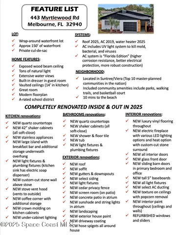 a living room with furniture a chandelier and a table