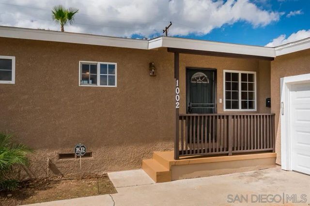 a porch with seating space