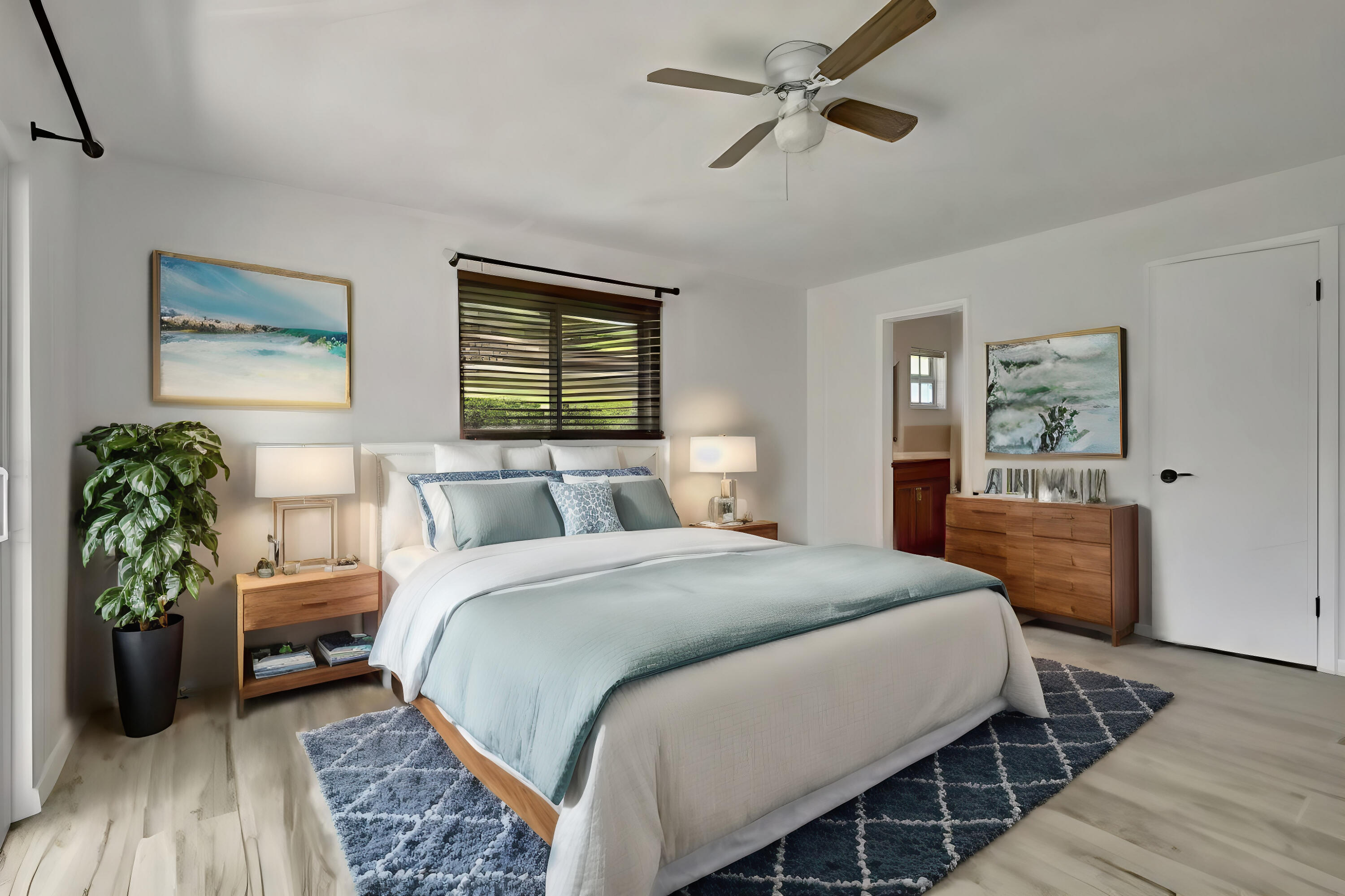 254 Northwest 11th Avenue Boca Raton, FL 33486 - Photo 26 of 66 a spacious bedroom with a bed table closet and a window