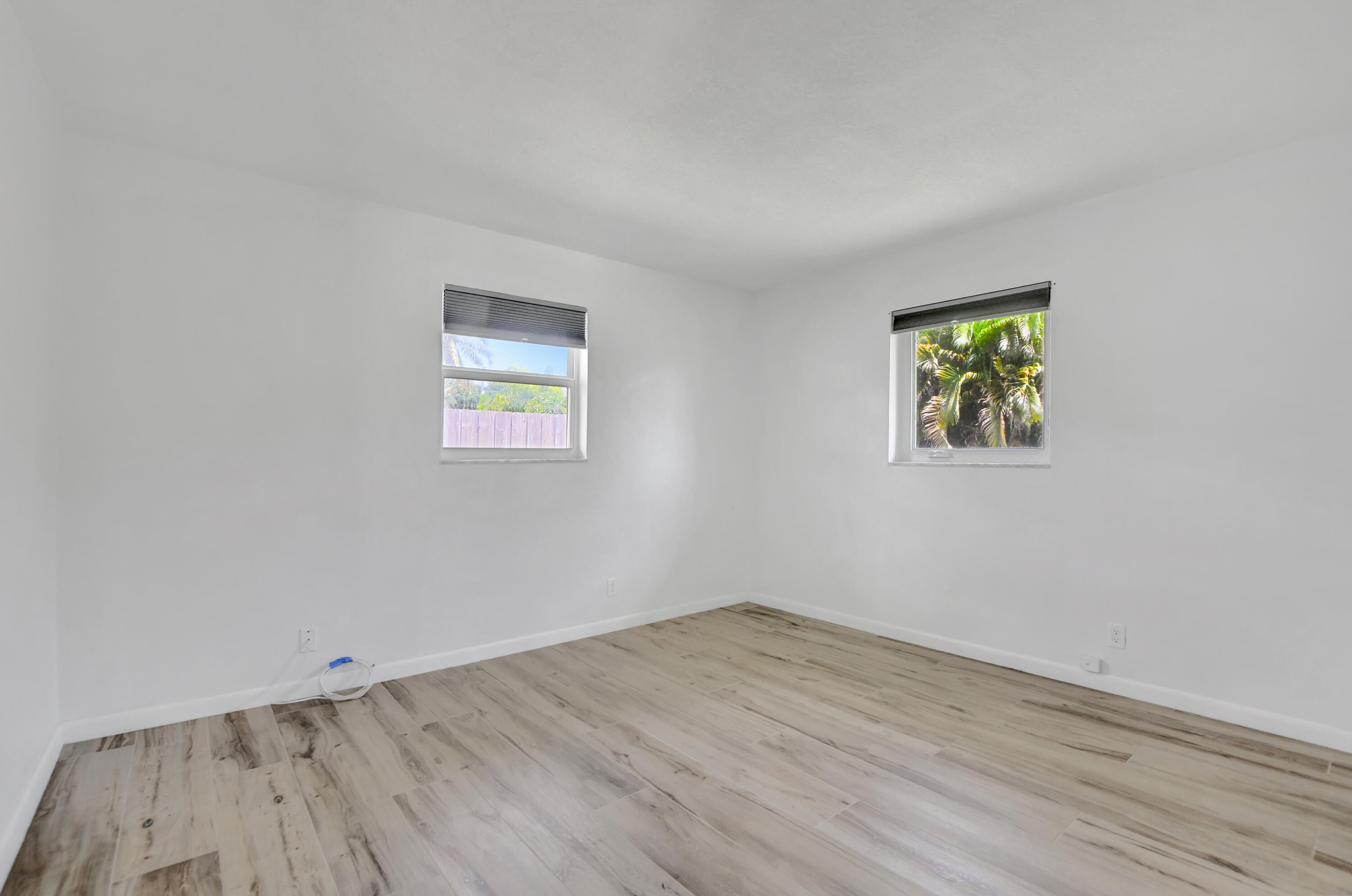 254 Northwest 11th Avenue Boca Raton, FL 33486 - Photo 37 of 66 an empty room with a window