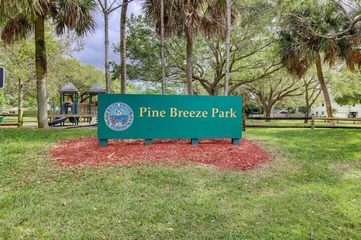 254 Northwest 11th Avenue Boca Raton, FL 33486 - Photo 63 of 66 a view of outdoor space with sign board and garden